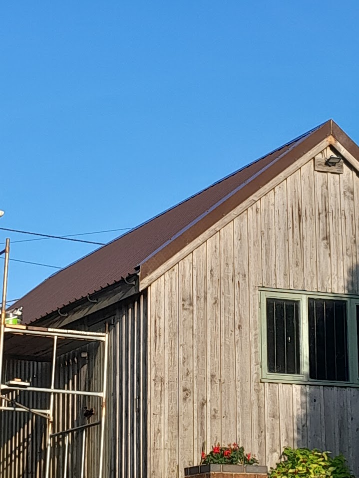 Timber framed and clad building with a pitched roof by MyDeskin Carpentry, Keynsham