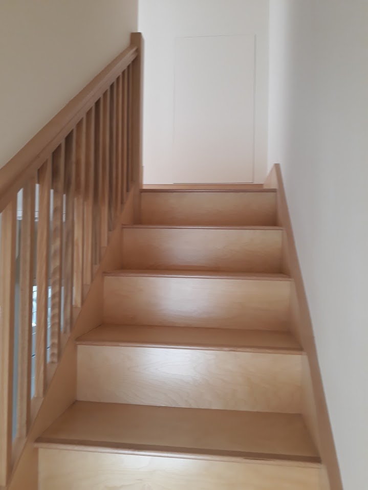 Newly fitted birch staircase with spindle balustrade by MyDeskin Carpentry, Keynsham